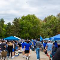 Overview picture of attendees during Family Day tailgate.